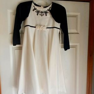Formal cream satin look dress with flowwrs and black jacket